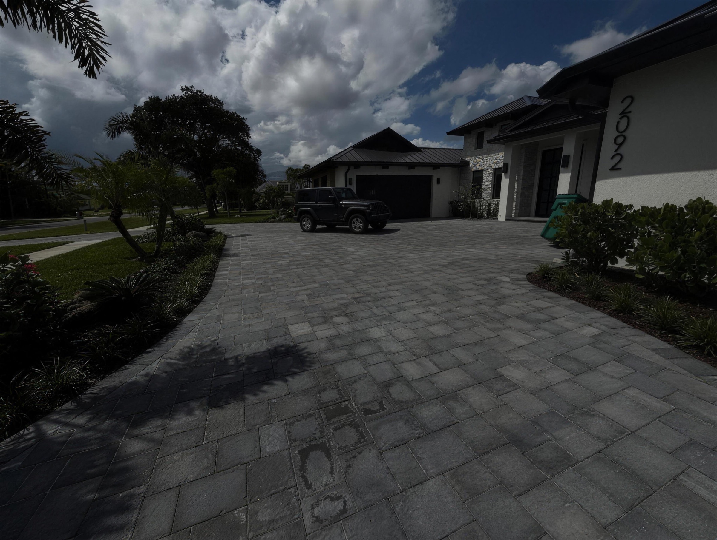 Modern sealed paver driveway in Viera, FL