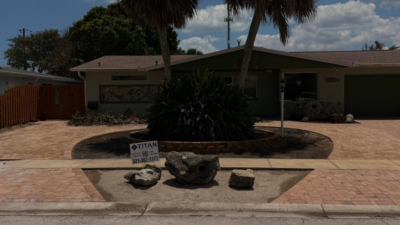 Finished teardrop driveway with Titan yard sign