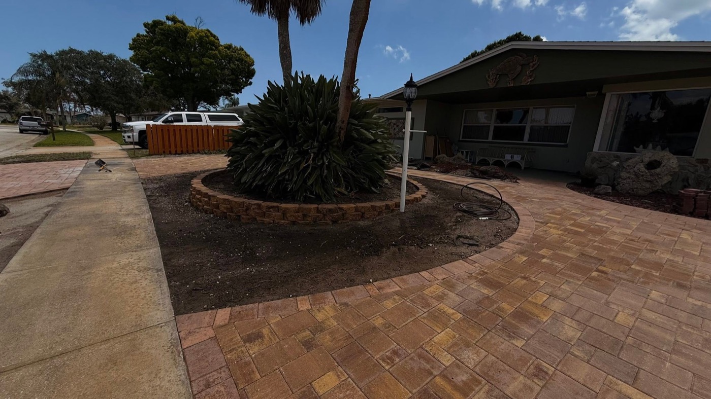 Wide view of the teardrop driveway transformation